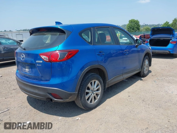 2014 Mazda CX-5 Sport z VIN JM3KE4BE4E0367444, wystawiony jako IAAI lot #42431272 z przebiegiem 181 191 mil mil oraz . Historia ofert i sprzedaży dostępna na DreamBid. Obrazek 4.