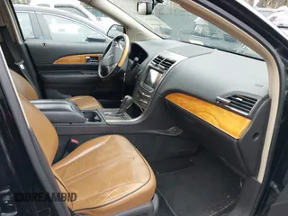 2011 Lincoln MKX with VIN 2LMDJ8JKXBBJ31869, listed as a IAAI auction lot 41710747 with 191,698 mi miles. Bid and sale history available at carsss.com. Image 5.