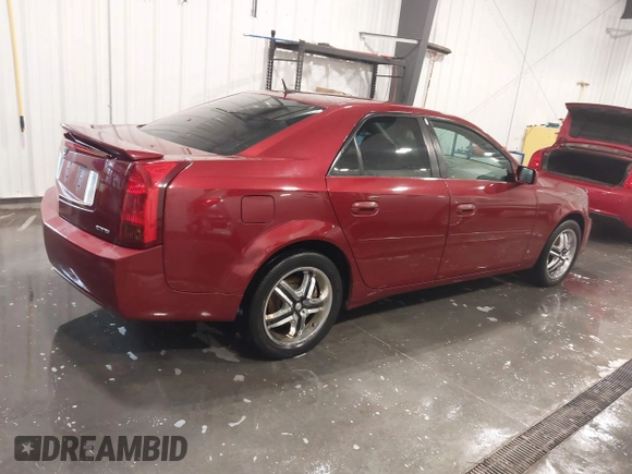 2006 Cadillac CTS with VIN 1G6DM57T560167128, listed as a IAAI auction lot 41911884 with 129,678 mi miles. Bid and sale history available at carsss.com. Image 4.