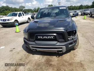 2015 Ram 1500 Rebel z VIN 1C6RR7YT4FS751370, wystawiony jako Copart lot #61675064 z przebiegiem 90 245 mil mil oraz Szkoda całkowita • Salvage title. Historia ofert i sprzedaży dostępna na DreamBid. Obrazek 11.