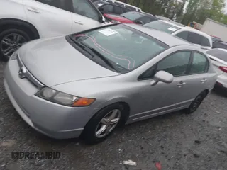 2006 Honda Civic LX with VIN 2HGFA16556H520894, listed as a IAAI auction lot 41963736 with 166,682 mi miles and . Bid and sale history available at DreamBid. Image 14.