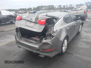 2014 Kia Optima EX z VIN 5XXGN4A75EG290132, wystawiony jako IAAI lot #41292706 z przebiegiem 155 793 mil mil oraz . Historia ofert i sprzedaży dostępna na DreamBid. Obrazek 6.