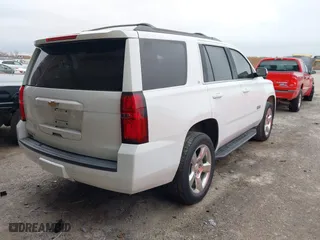 2018 Chevrolet Tahoe LT with VIN 1GNSCBKC3JR138624, listed as a IAAI auction lot 41483062 with 80,107 mi miles. Bid and sale history available at carsss.com. Image 4.