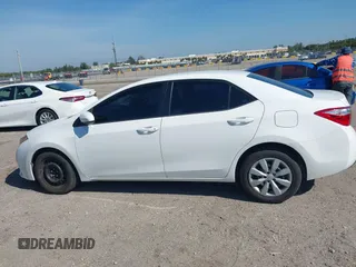 2015 Toyota Corolla L with VIN 2T1BURHE1FC252615, listed as a IAAI auction lot 41884936 with 113,805 mi miles and . Bid and sale history available at DreamBid. Image 14.