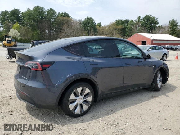 2023 Tesla Model Y Long Range with VIN 7SAYGDEE7PA031199, listed as a Copart auction lot 53876105 with 10,835 mi miles and Salvage Title. Bid and sale history available at DreamBid. Image 3.