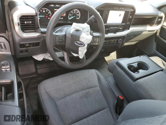 2023 Ford F-150 XL with VIN 1FTMF1C50PKD98385, listed as a Copart auction lot 46917365 with 18,315 mi miles and Salvage Title. Bid and sale history available at carsss.com. Image 8.