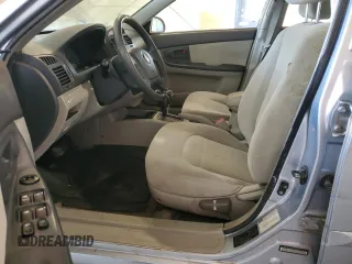 2005 Kia Spectra LX with VIN KNAFE121955160165, listed as a Copart auction lot 74695764 with 160,670 mi miles and Salvage Title. Bid and sale history available at carsss.com. Image 7.