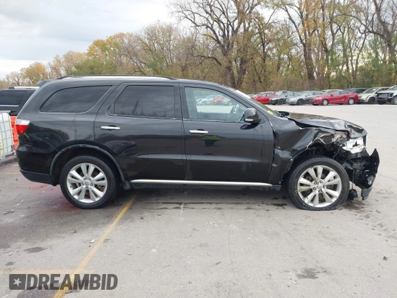2013 Dodge Durango Crew with VIN 1C4RDHDG8DC592706, listed as a IAAI auction lot 40745114 with 95,757 mi miles and . Bid and sale history available at DreamBid. Image 13.