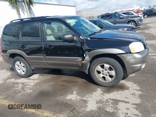 2004 Mazda Tribute LX with VIN 4F2CZ941X4KM29568, listed as a IAAI auction lot 41735353 with 285,989 mi miles and . Bid and sale history available at carsss.com. Image 6.