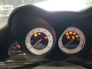 2009 Mercedes-Benz SL 550 z VIN WDBSK71F99F152687, wystawiony jako Copart lot #58904225 z przebiegiem 128 689 mil mil oraz Tytuł czysty. Historia ofert i sprzedaży dostępna na DreamBid. Obrazek 9.
