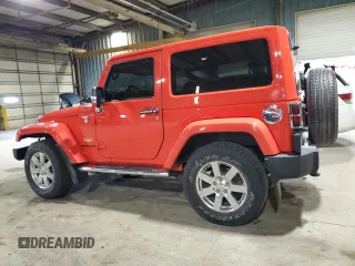 2013 Jeep Wrangler Sahara z VIN 1C4AJWBG2DL569838, wystawiony jako Copart lot #54705065 z przebiegiem 67 093 mil mil oraz Szkoda całkowita • Salvage title. Historia ofert i sprzedaży dostępna na DreamBid. Obrazek 2.