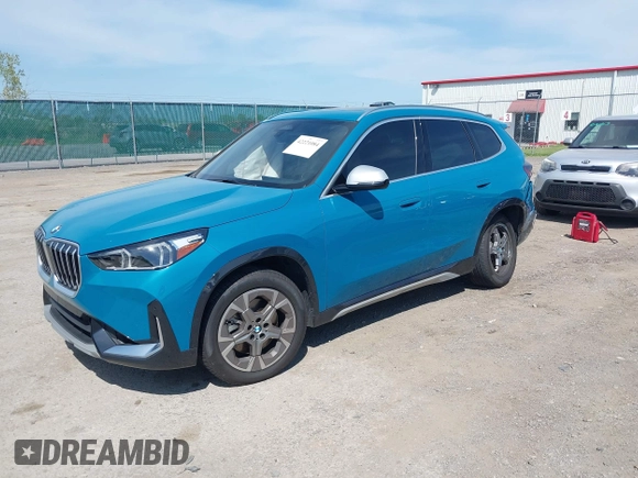 2023 BMW X1 xDrive28i with VIN WBX73EF00P5W52935, listed as a IAAI auction lot 42221084 with 16,394 mi miles and . Bid and sale history available at DreamBid. Image 17.