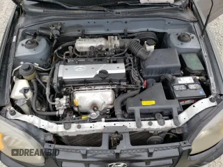 2004 Hyundai Accent GL with VIN KMHCG35C44U299645, listed as a Copart auction lot 63728174 with 159,604 mi miles and Clean Title. Bid and sale history available at carsss.com. Image 11.