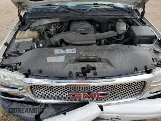 2003 GMC Yukon Denali z VIN 1GKEK63U33J316027, wystawiony jako Copart lot #56869815 z przebiegiem 200 916 mil mil oraz Szkoda całkowita • Salvage title. Historia ofert i sprzedaży dostępna na DreamBid. Obrazek 12.