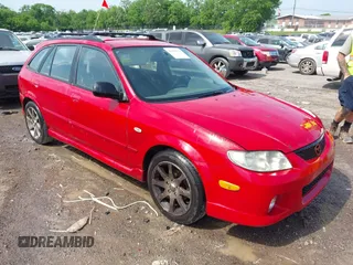 2003 Mazda Protege with VIN JM1BJ245231214946, listed as a IAAI auction lot 42163979 with 220,081 mi miles and . Bid and sale history available at DreamBid. Image 1.