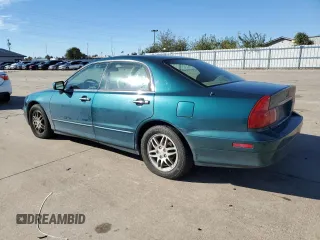 2001 Mitsubishi Diamante LS z VIN 6MMAP67P11T004859, wystawiony jako Copart lot #78678394 z przebiegiem 49 671 mil mil oraz Tytuł czysty. Historia ofert i sprzedaży dostępna na DreamBid. Obrazek 2.
