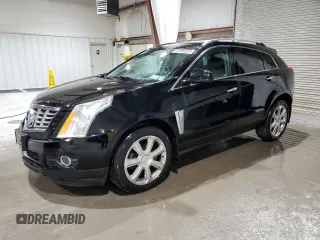 2014 Cadillac SRX Performance Collection z VIN 3GYFNFE34ES680108, wystawiony jako Copart lot #53984635 z przebiegiem 87 981 mil mil oraz Szkoda całkowita • Salvage title. Historia ofert i sprzedaży dostępna na DreamBid. Obrazek 1.