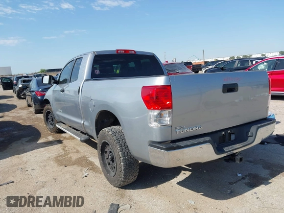 2011 Toyota Tundra with VIN 5TFRM5F18BX033833, listed as a IAAI auction lot 42257200 with 108,046 mi miles and . Bid and sale history available at DreamBid. Image 3.