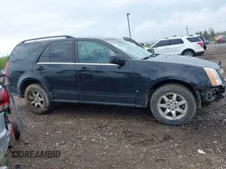 2008 Cadillac SRX RWD z VIN 1GYEE637180139577, wystawiony jako IAAI lot #42161039 z przebiegiem 159 816 mil mil oraz . Historia ofert i sprzedaży dostępna na DreamBid. Obrazek 14.