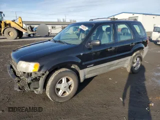 2001 Ford Escape XLS with VIN 1FMYU02101KE82516, listed as a Copart auction lot 46163255 with 190,989 mi miles and Salvage Title. Bid and sale history available at carsss.com. Image 1.
