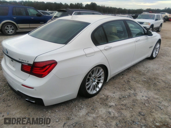 2015 BMW 7 Series 750Li with VIN WBAYE8C50FD781160, listed as a IAAI auction lot 41061232 with 154,496 mi miles. Bid and sale history available at carsss.com. Image 4.