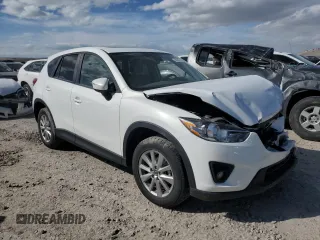 2015 Mazda CX-5 Touring with VIN JM3KE4CY7F0553862, listed as a Copart auction lot 48392725 with 122,530 mi miles and Salvage Title. Bid and sale history available at carsss.com. Image 4.