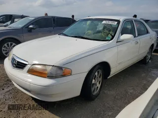 2000 Mazda 626 LX with VIN 1YVGF22C3Y5102174, listed as a Copart auction lot 75287594 with 0 mi miles and Non Repairable. Bid and sale history available at carsss.com. Image 1.