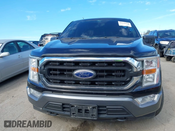 2022 Ford F-150 XL with VIN 1FTMF1E56NKE03194, listed as a IAAI auction lot 41620978 with 76,689 mi miles and . Bid and sale history available at DreamBid. Image 12.