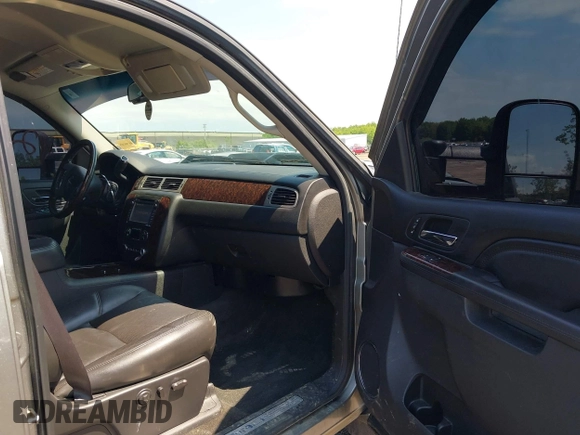 2013 GMC Sierra 2500HD Denali with VIN 1GT125E80DF154320, listed as a IAAI auction lot 42264742 with 171,013 mi miles and . Bid and sale history available at DreamBid. Image 5.