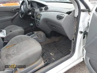 2004 Ford Focus ZX3 with VIN 3FAFP31Z94R120332, listed as a IAAI auction lot 40772071 with 218,128 mi miles and . Bid and sale history available at DreamBid. Image 5.