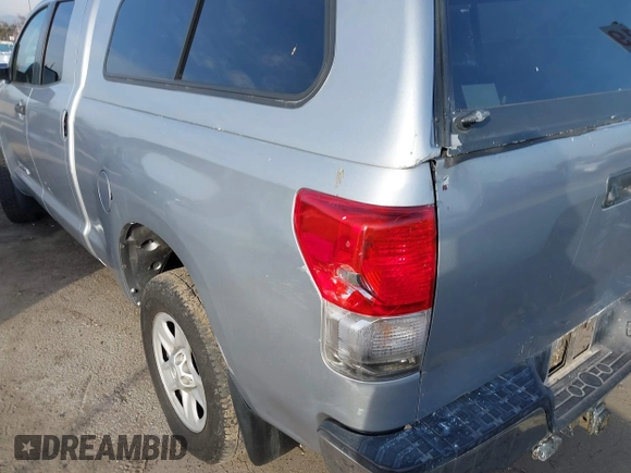2013 Toyota Tundra z VIN 5TFRM5F17DX063683, wystawiony jako IAAI lot #41603196 z przebiegiem Nie podano mil oraz . Historia ofert i sprzedaży dostępna na DreamBid. Obrazek 6.