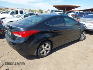 2013 Hyundai Elantra Limited with VIN KMHDH4AE6DU920835, listed as a IAAI auction lot 42084200 with 130,813 mi miles. Bid and sale history available at carsss.com. Image 4.