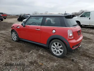 2012 MINI Hardtop S with VIN WMWSV3C59CT385254, listed as a Copart auction lot 52675675 with 76,250 mi miles and Salvage Title. Bid and sale history available at DreamBid. Image 2.