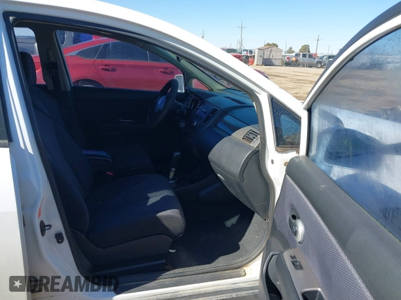 2009 Nissan Versa 1.8 SL with VIN 3N1BC13E89L410688, listed as a IAAI auction lot 41447457 with 182,807 mi miles. Bid and sale history available at carsss.com. Image 5.