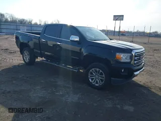 2015 GMC Canyon 4WD SLT with VIN 1GTG6CE34F1153369, listed as a IAAI auction lot 41277810 with 135,821 mi miles. Bid and sale history available at carsss.com. Image 1.