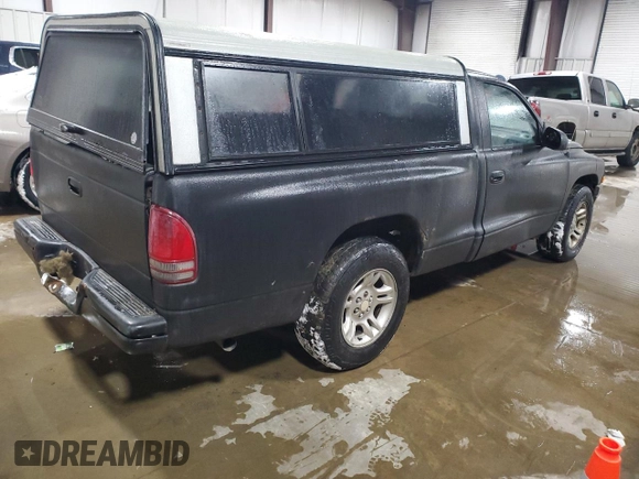 2002 Dodge Dakota with VIN 1B7FL16X32S557570, listed as a Copart auction lot 88974295 with 201,791 mi miles and Salvage Title. Bid and sale history available at carsss.com. Image 3.