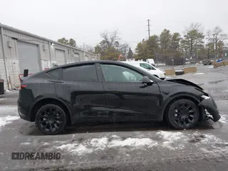 2023 Tesla Model Y Long Range with VIN 7SAYGDEE8PA183301, listed as a IAAI auction lot 41498769 with 82,893 mi miles and . Bid and sale history available at carsss.com. Image 13.