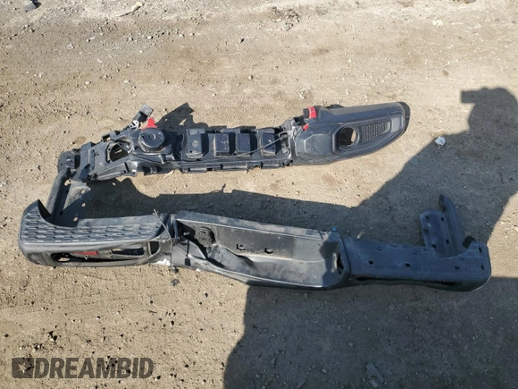 2023 Jeep Gladiator Rubicon with VIN 1C6JJTBG8PL550219, listed as a Copart auction lot 54627685 with 9,671 mi miles and Salvage title. Bid and sale history available at DreamBid. Image 12.