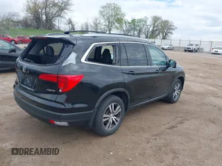 2017 Honda Pilot EX-L with VIN 5FNYF6H51HB045854, listed as a IAAI auction lot 42178053 with 114,913 mi miles and . Bid and sale history available at DreamBid. Image 4.