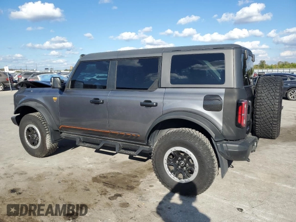2022 Ford Bronco with VIN 1FMEE5DH1NLB82717, listed as a Copart auction lot 83230614 with 21,593 mi miles and Salvage Title. Bid and sale history available at DreamBid. Image 2.