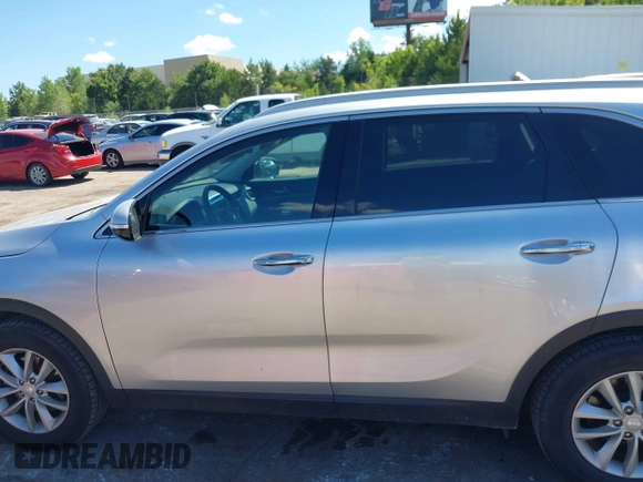 2018 Kia Sorento LX with VIN 5XYPG4A5XJG394663, listed as a IAAI auction lot 40222497 with 125,838 mi miles and . Bid and sale history available at DreamBid. Image 14.