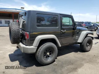 2009 Jeep Wrangler X z VIN 1J4FA24179L716499, wystawiony jako Copart lot #58342675 z przebiegiem 116 871 mil mil oraz Szkoda całkowita • Salvage title. Historia ofert i sprzedaży dostępna na DreamBid. Obrazek 3.