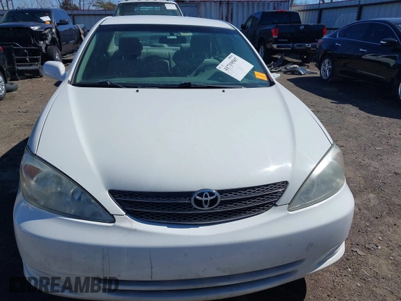 2003 Toyota Camry LE with VIN 4T1BE32K63U249910, listed as a IAAI auction lot 41719507 with 125,168 mi miles and . Bid and sale history available at DreamBid. Image 12.