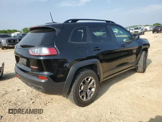 2022 Jeep Cherokee Trailhawk с VIN 1C4PJMBX8ND502686, выставлен на аукционе Copart как лот 51180645 с пробегом 62 865 миль миль и Списание • Salvage title. История ставок и продаж доступна на DreamBid. Изображение 3.