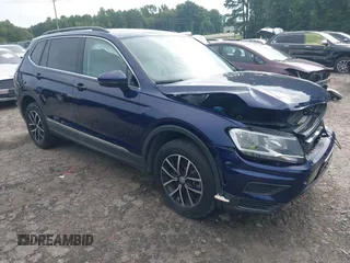 2021 Volkswagen Tiguan SE with VIN 3VV2B7AX6MM157561, listed as a IAAI auction lot 42733547 with 44,454 mi miles and . Bid and sale history available at DreamBid. Image 1.