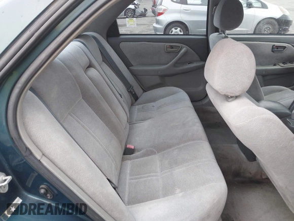 1997 Toyota Camry LE z VIN 4T1BG22K5VU024448, wystawiony jako IAAI lot #42019670 z przebiegiem 133 385 mil mil oraz . Historia ofert i sprzedaży dostępna na DreamBid. Obrazek 8.