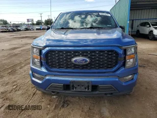 2023 Ford F-150 XL with VIN 1FTEW1EP8PKE04419, listed as a Copart auction lot 60843835 with 31,684 mi miles and Salvage title. Bid and sale history available at DreamBid. Image 5.