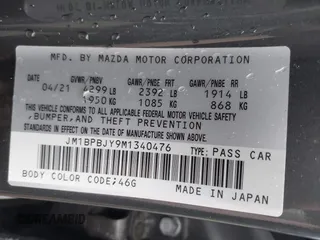2021 Mazda 3 2.5 Turbo with VIN JM1BPBJY9M1340476, listed as a IAAI auction lot 41921955 with 43,486 mi miles. Bid and sale history available at carsss.com. Image 9.