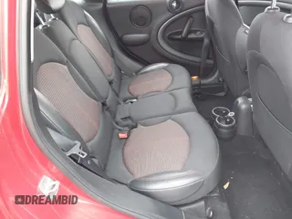2015 MINI Countryman S with VIN WMWZC3C56FWP53249, listed as a IAAI auction lot 42256130 with 104,415 mi miles and . Bid and sale history available at DreamBid. Image 8.