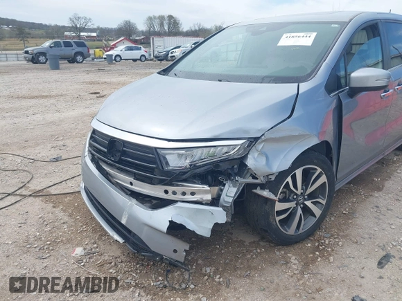 2021 Honda Odyssey Touring with VIN 5FNRL6H8XMB034837, listed as a IAAI auction lot 41856444 with 84,950 mi miles. Bid and sale history available at carsss.com. Image 6.